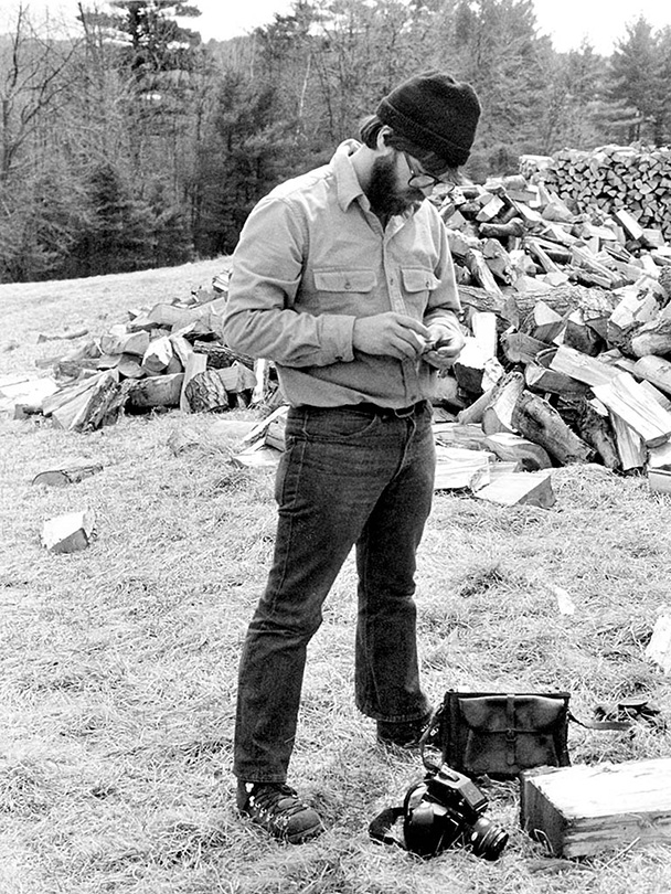 Mark Lindquist, Preparing film for the film cassette of his Mamiya M645 at the MacDowell Colony, Peterborough, NH, 1980