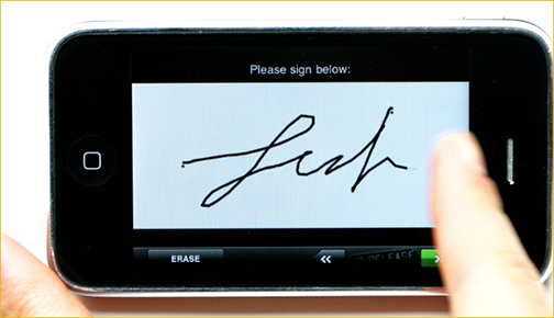 The model signs the release on the iPhone screen with a fingertip.