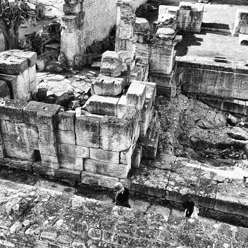 People walking in the ruins of the Arles Amphitheater, Arles, France