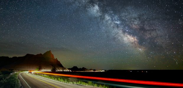 Streaks of light from our car create an interesting foreground that leads to the Milky Way. The sky was exposed separately from the foreground to allow for tracking stars and a different exposure.