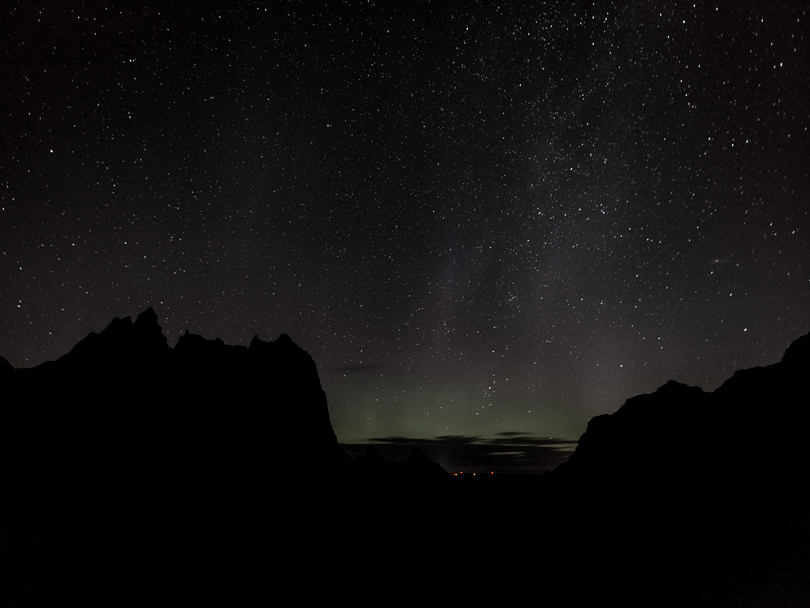 The night sky and northern lights the way they looked to my eye. You might be able to see just a little color but our night vision is primarily black and white.