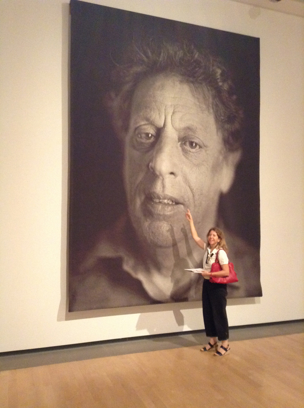 Natalie at the Phoenix Art Museum, looking at a giant photograph of Philip Glass by Chuck Close, part of his 'Family and Others' series.