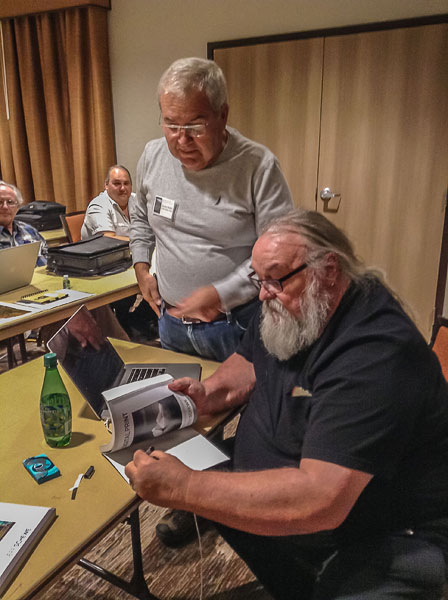 Jeff signing his book on printing during the 2017 Zion Summit