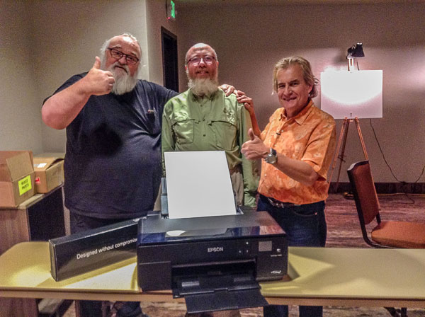 Last year we raffled the Epson Printer we used to print participants work during the Summit. The raffle was won by Mike (between Jeff and Alain) who returned home with a free printer, a set of extra ink cartridges and boxes of Epson inkjet paper.