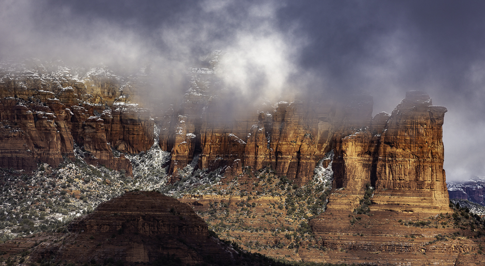 Bright mist swirls above Coffeepot formation