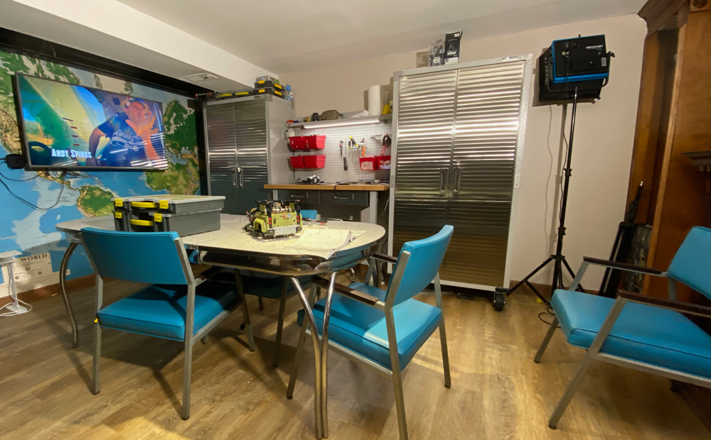 The work areas has a classic old heirloom kitchen table to do work on, a tTV on the wall for video previews or just watching show while working in the Man Cave.