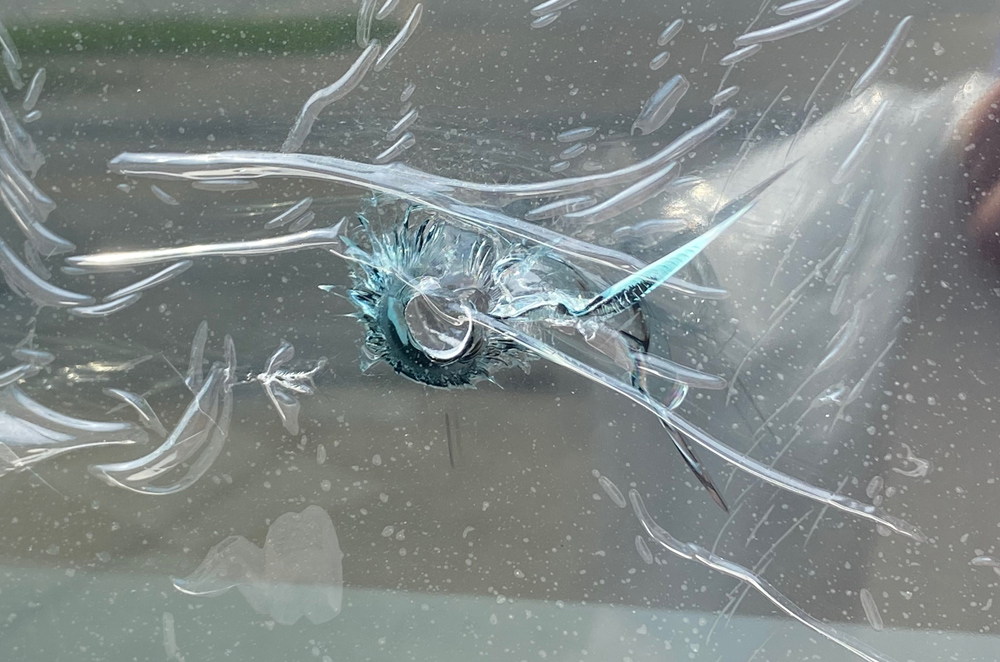 Bullet hole in the window. A remnant of the protests in the city