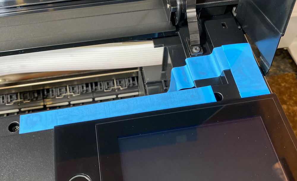 Epson blue tape. Lots of the tape is well hidden. 