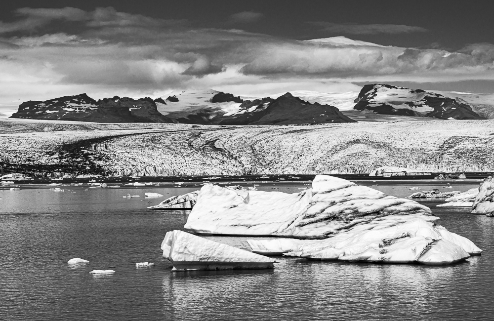 Icebergs and melt waters flow to the sea at Jokulsarlon, Iceland
