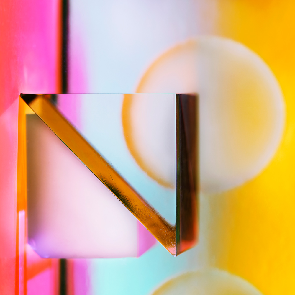 Deborah Bay (USA) Triangle Theorem from the series Traveling Light Image from the Traveling Light series exploring the interaction of light and color with optical objects. The series follows in a long lineage of experimental studies that investigate the most elemental components of photographic processes: light and lenses. https://deborahbay.com/