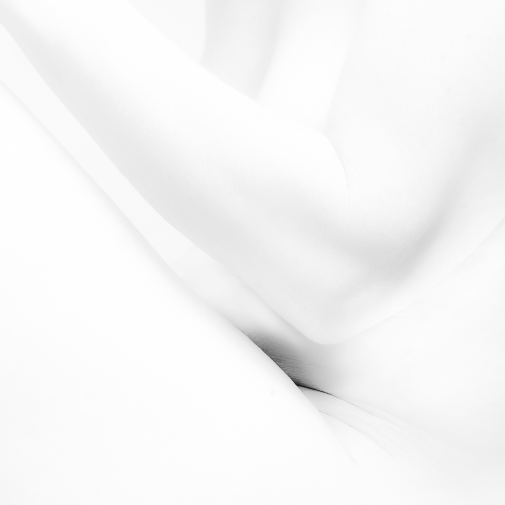 Karine Coll (France) Diagonale perdue from the series Body geometry A series in black and white, ethereal, in which the body becomes abstraction, a fragmented, transformed mass, depicted only by way of a play of lines, curves, folds, shadows. Here the elusive and delicate body takes on a whole new dimension, leading the eye into a geometry of the flesh. A series in square format to force the simplicity of the look and widen the field of vision in an ideal geometry. https://www.karinecoll.com/