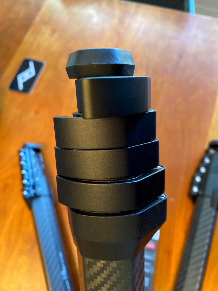 The leg clamps. Easy to open all at one time.