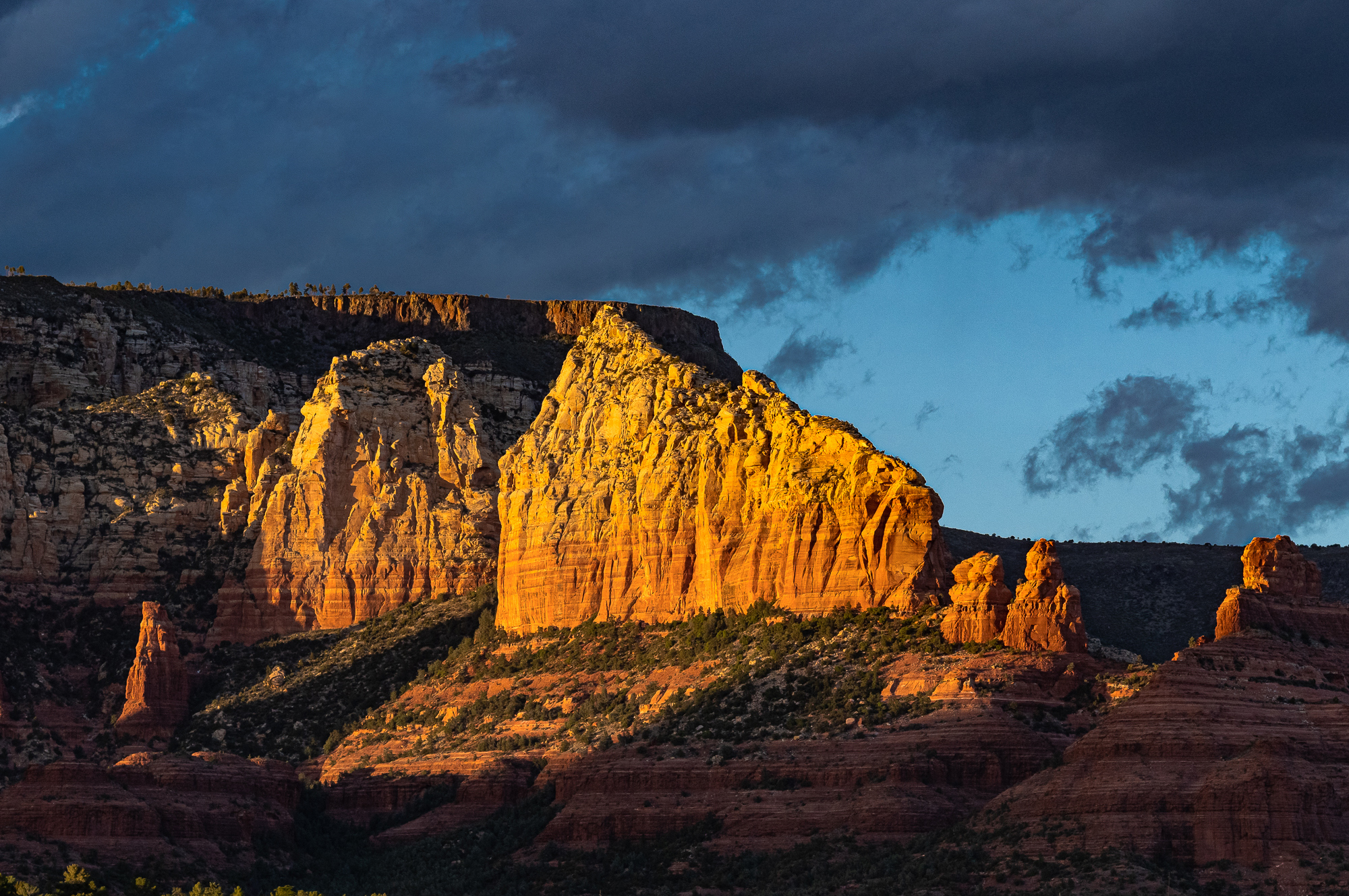 The Fin in Strong Sunset Lighting Against a Dark Sky