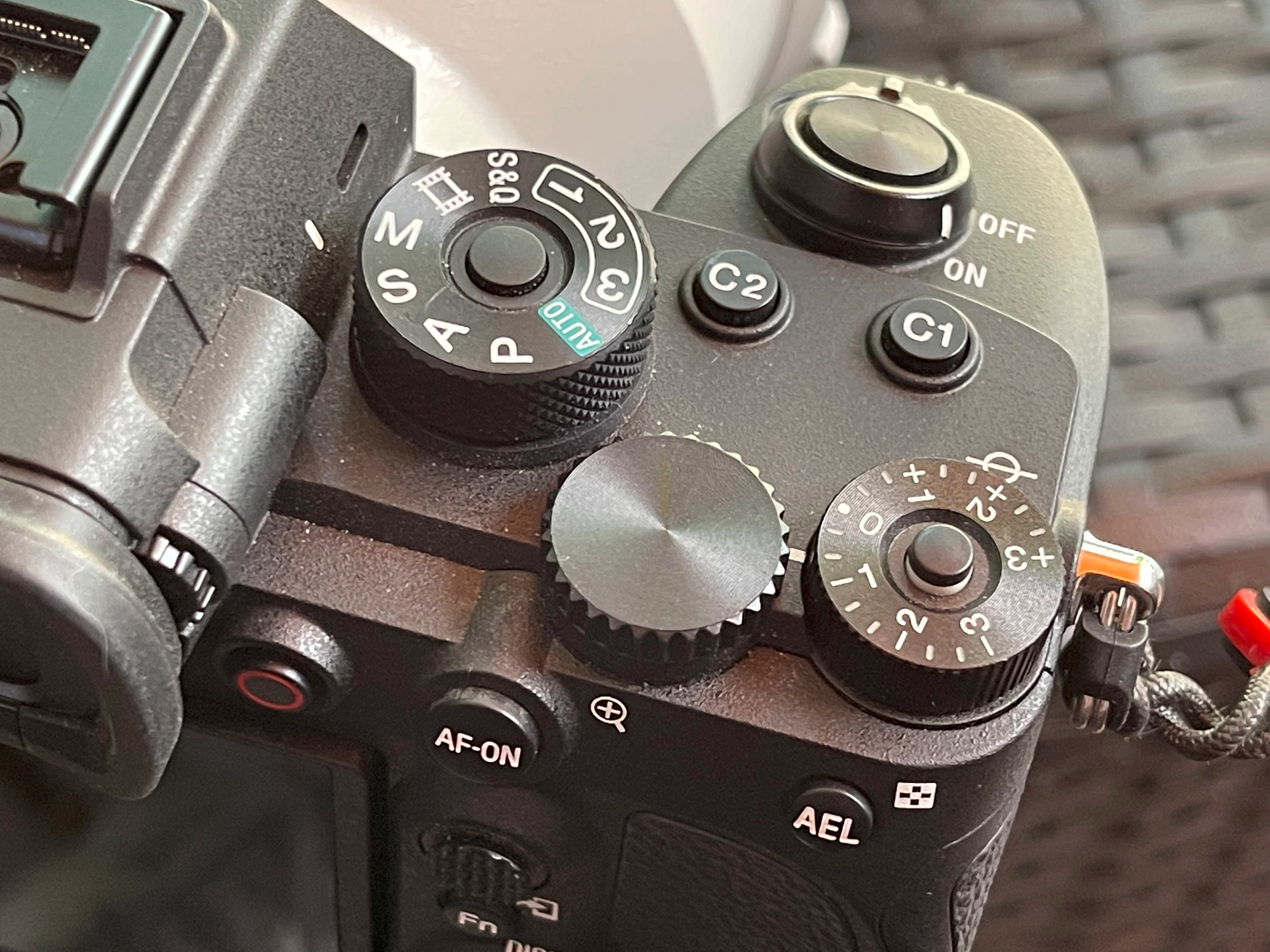 The right side of the camera. All controls are easy to reach and work.