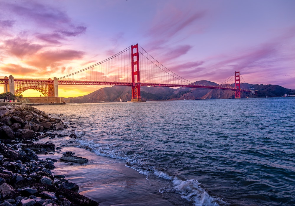 Photo of the golden gate bridge taken from the shores of san fransisco