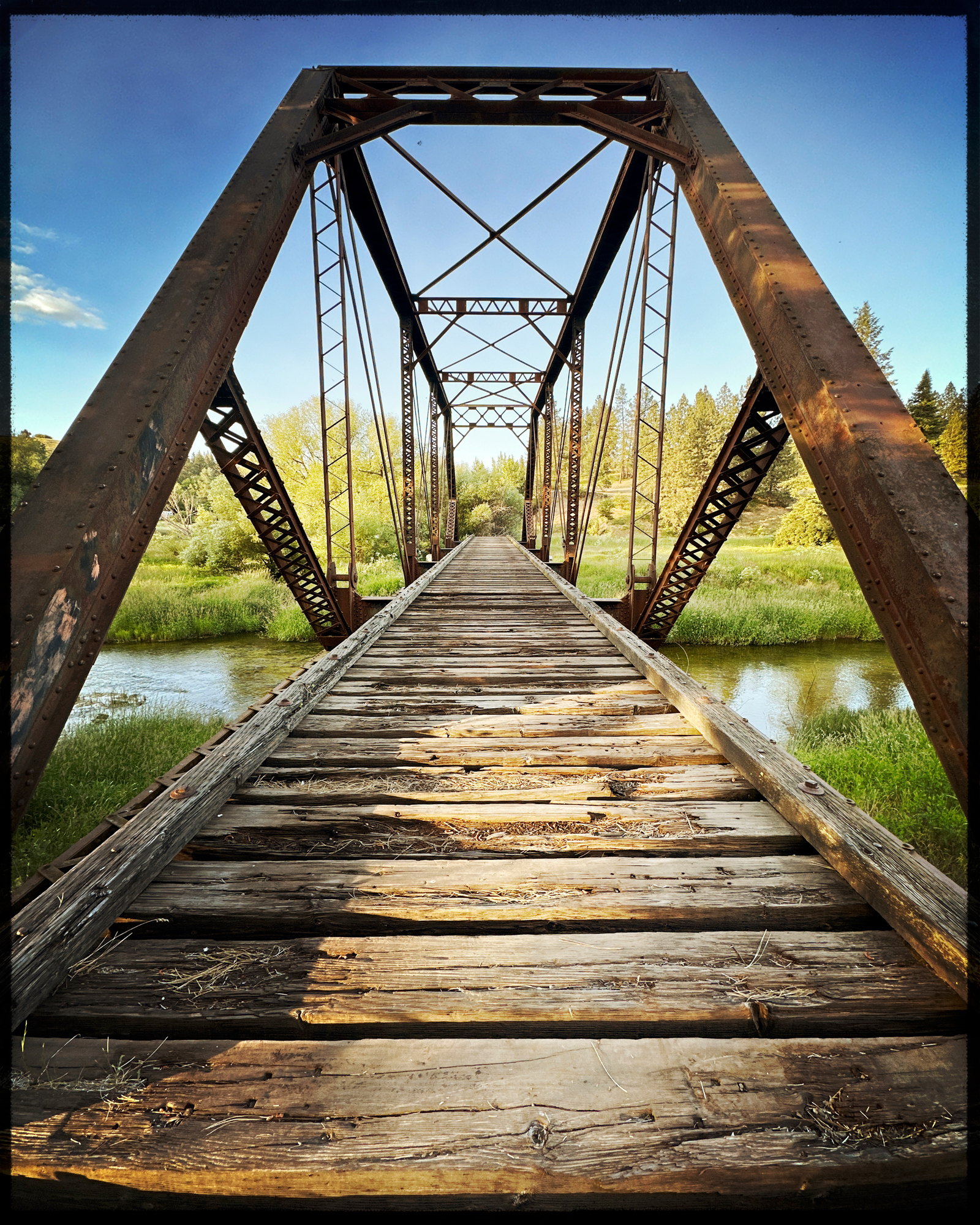 An ol Railroad bridge a long abandoned town
