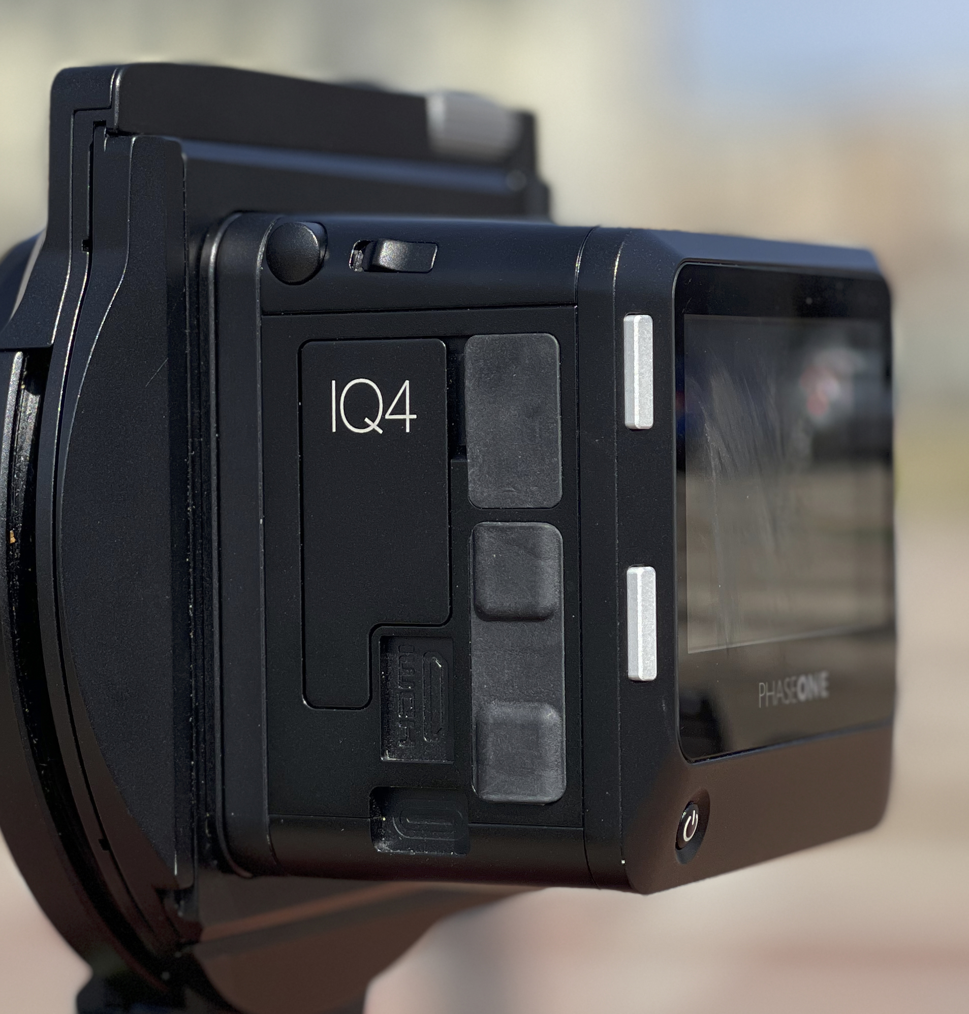 The IQ 150 digital back. Under the rubber covers are numerous ports for connection to a computer, flash and remote as well as the storage card