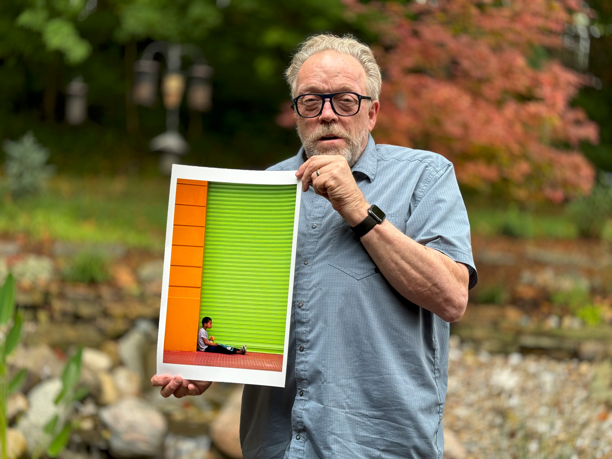 Kevin Raber the artist shows off a 10x14.75 inch print