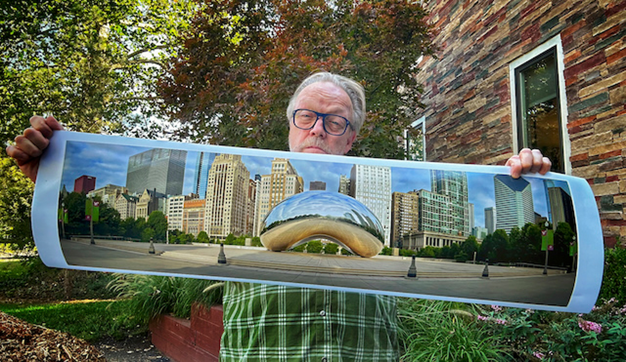 Kevin Raber the artist shows a 42 inch print