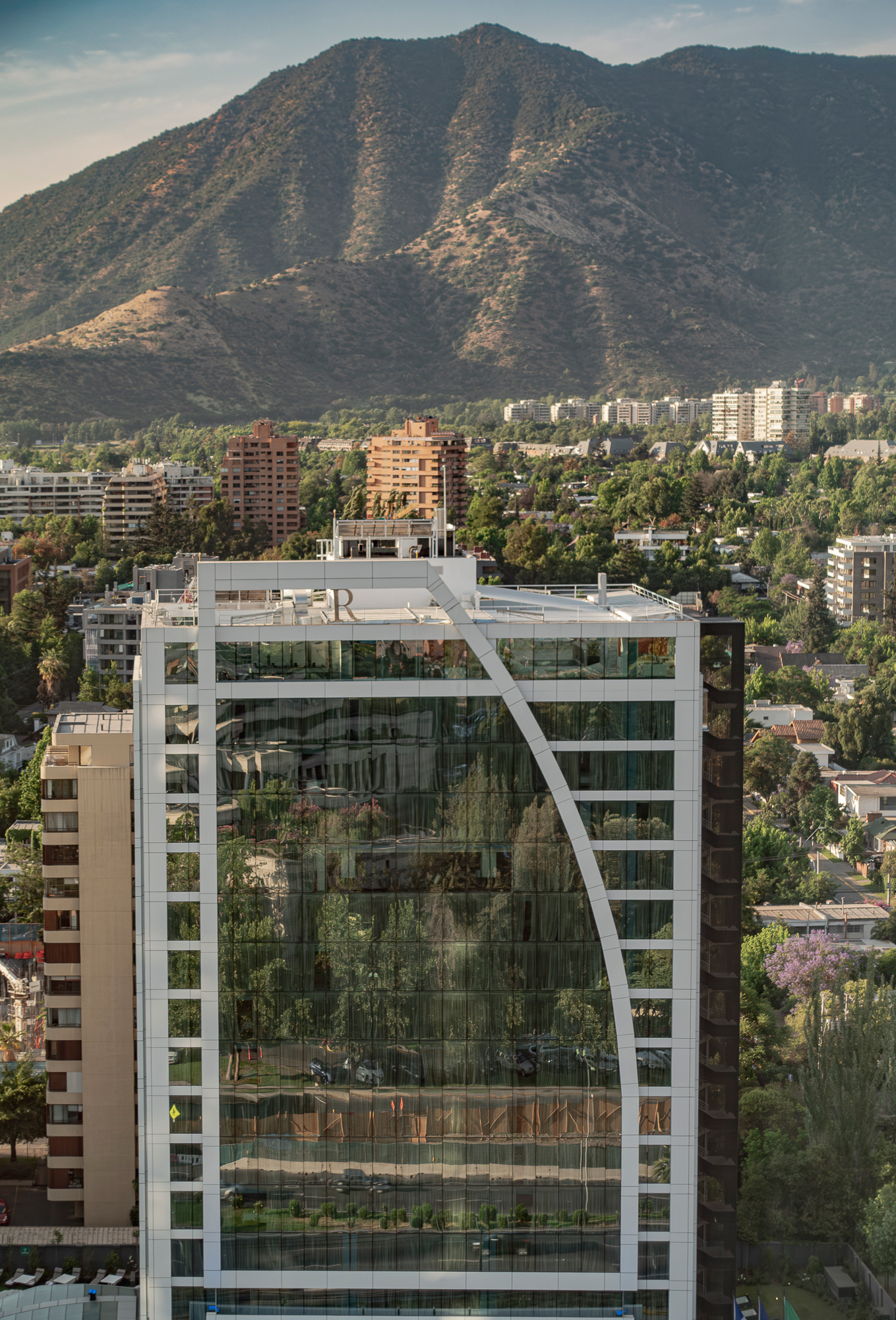 Downward angled camera reveals street level reflections