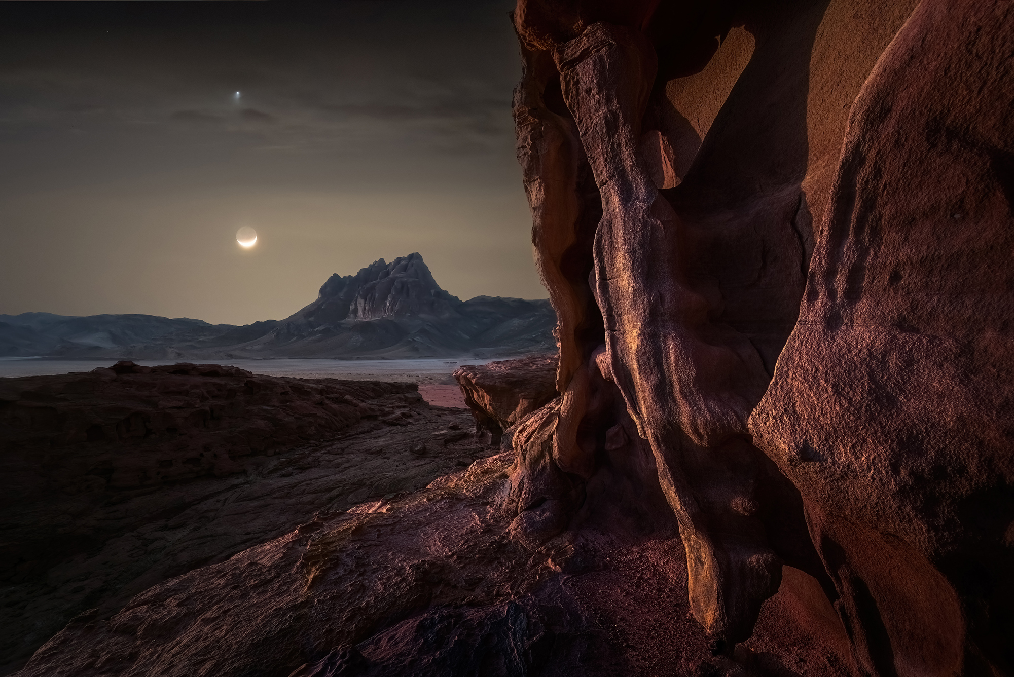 Crescent moon over Vadi Rum photographed by Michael Nalsky, Israel Location Details: Vadi Rum Jordan