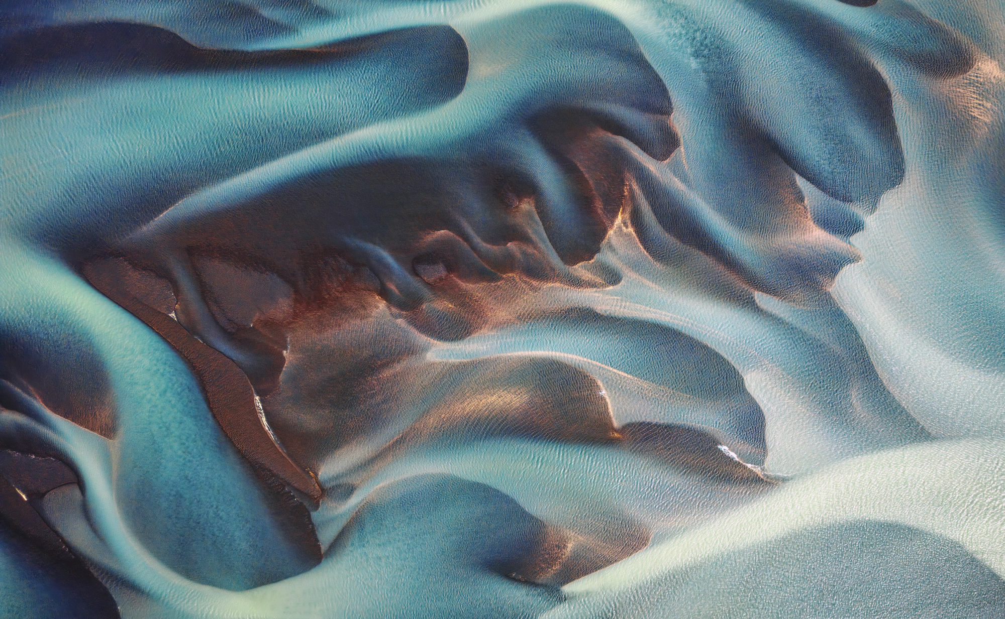 Watery Shapes photographed by Phillip Glombik, Germany Location Details: River …lfus‡, Iceland