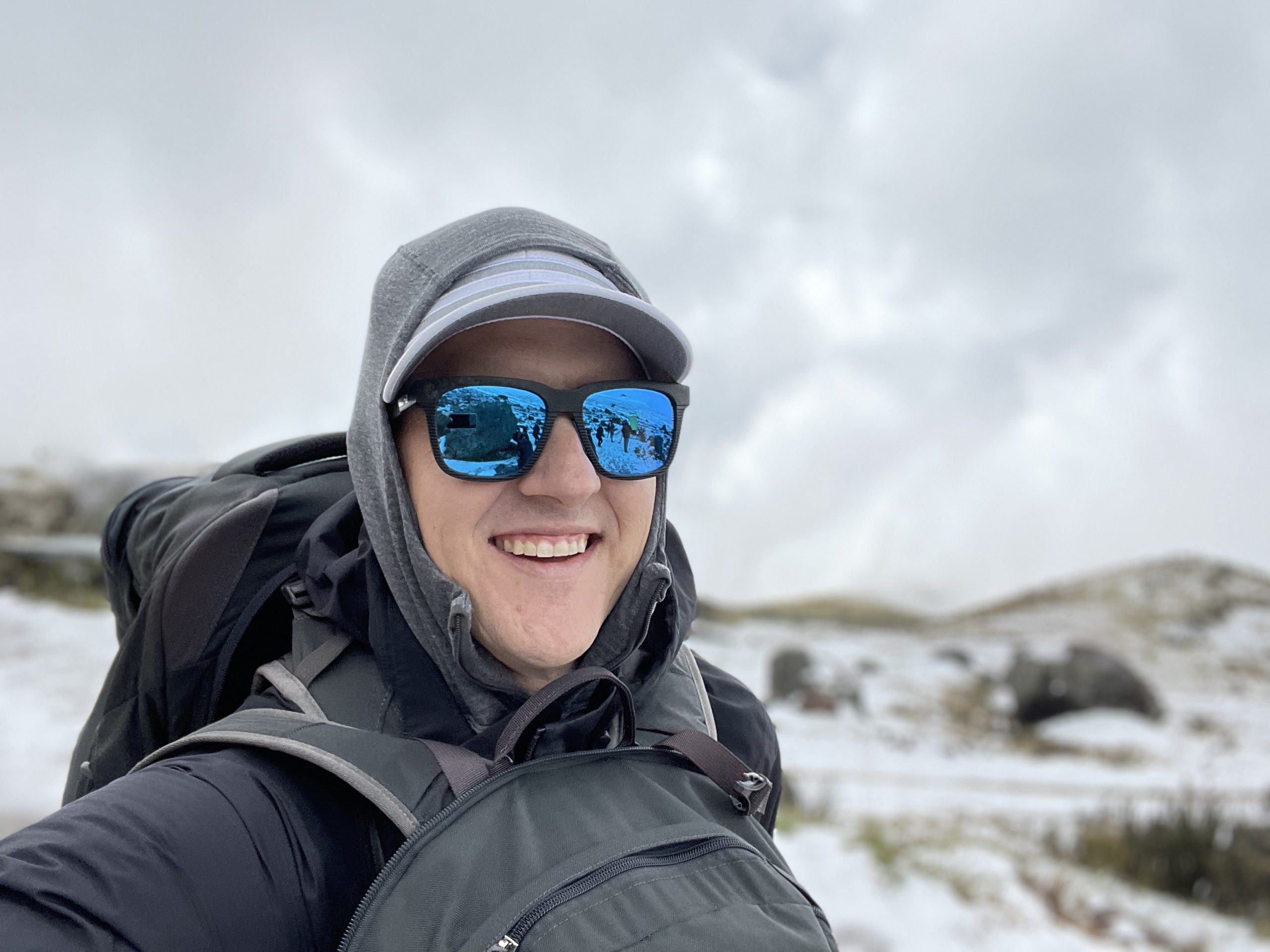 Image of Jon (Swindy) Swindall standing on a frozen mountain