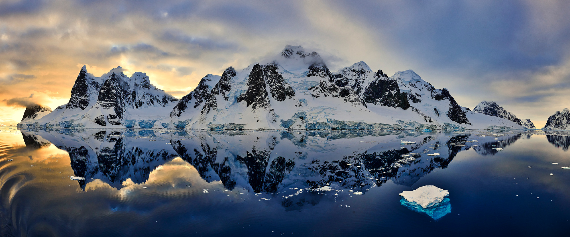 aire Channel at sunrise. This image shows both ends of the channel. Made with 32 images from a moving ship.