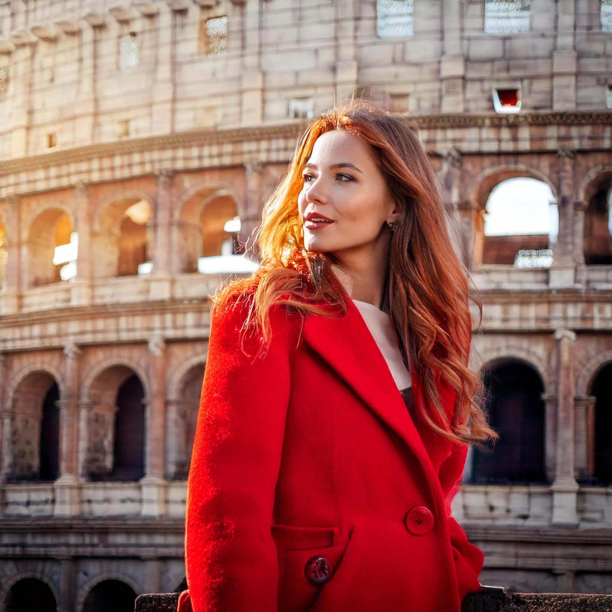 FireflyPhoto realisticglamorousmodelwearingredcoatinfrontoftheColosseuminRome