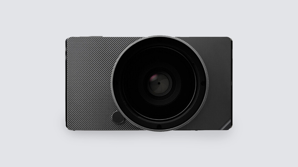 Sigma BF mirrorless camera with minimalist unibody aluminum design, featuring a revolutionary stripped-down interface for a pure photography experience.