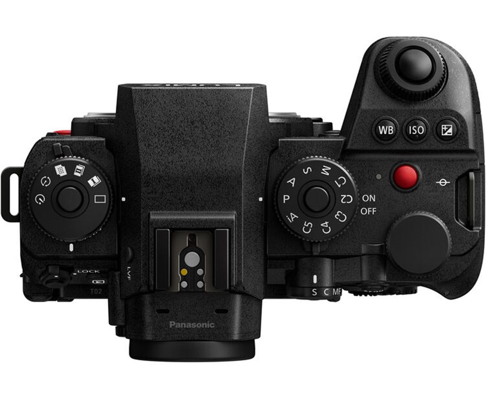 Top view of the Panasonic Lumix S1R II mirrorless camera, showcasing its ergonomic control layout, dual command dials, customizable mode dial, high-resolution electronic viewfinder, and hot shoe mount, designed for professional photography and videography.