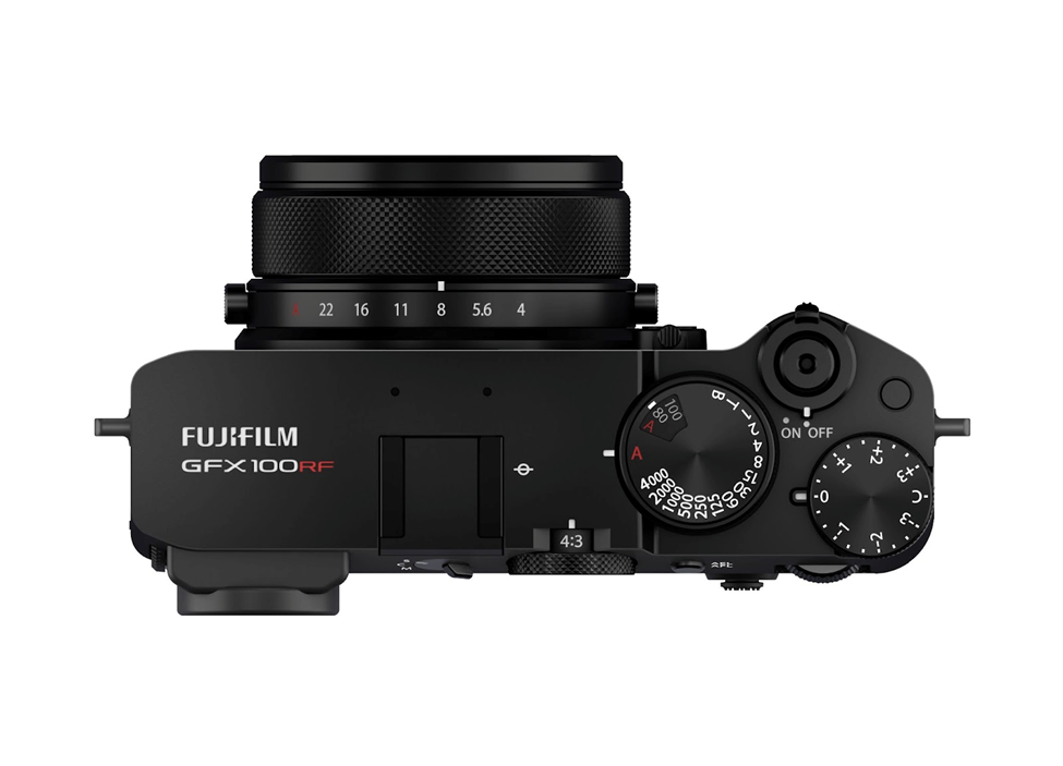 "Top view of the Fujifilm GFX100RF medium format mirrorless camera, highlighting its manual dials, compact rangefinder-style design, and premium build. The GFX100RF offers a 102MP sensor, classic controls, and exceptional image quality for professional photographers.