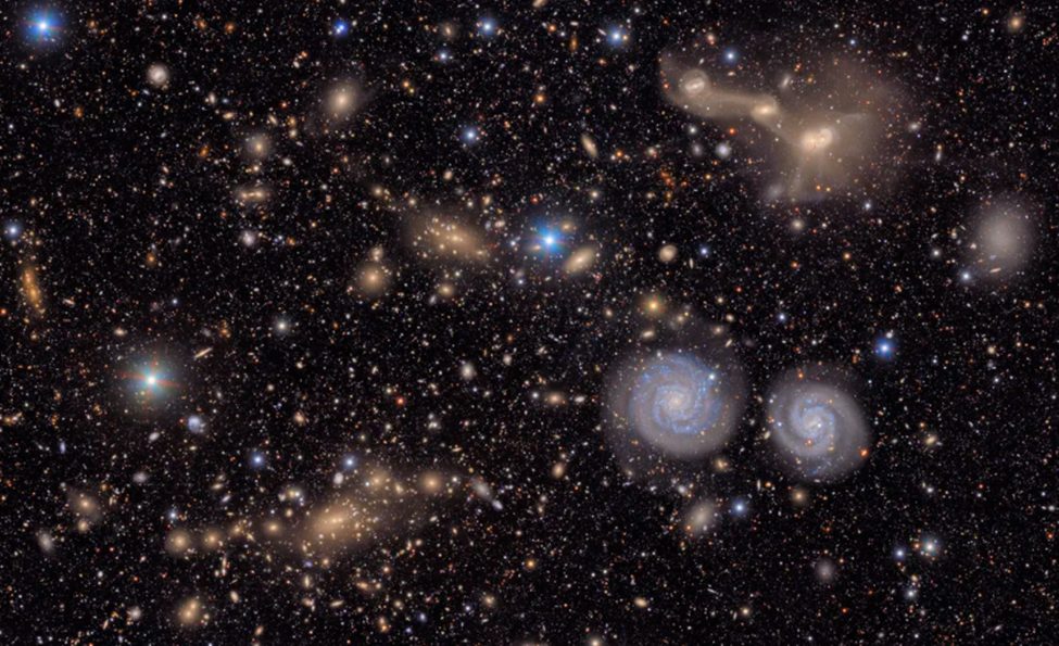 Two prominent spiral galaxies, three merging galaxies and several stars within our own Milky Way appear in this image, a mere section of the Rubin Observatory's full view of the Virgo Cluster. NSF–DOE Vera C. Rubin Observatory