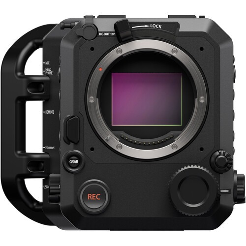 Close-up front view of the Fujifilm GFX Eterna cinema camera body, showing the large G-mount sensor, a prominent orange "REC" button, and various port labels like Mic and Ethernet on the side handle.