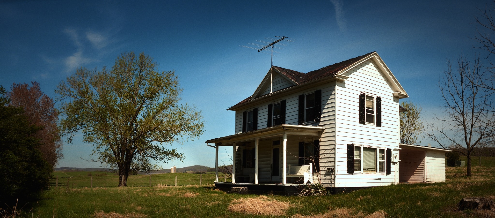 Farmhouse panorama with enhanced tones and contrast