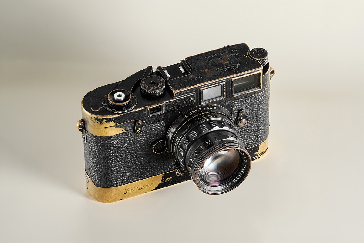 Black paint Leica MP camera with worn brass patina finish