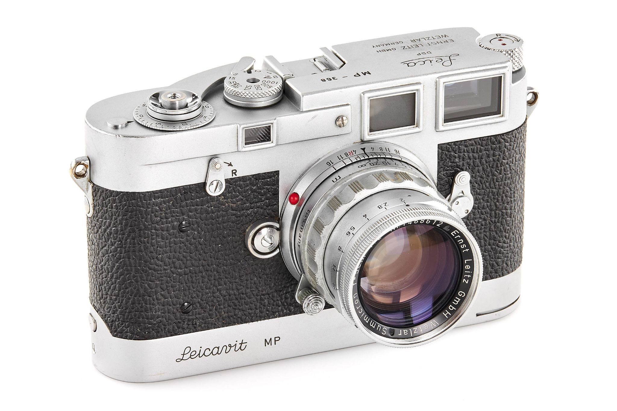 Leica MP chrome camera with silver body and Summicron lens