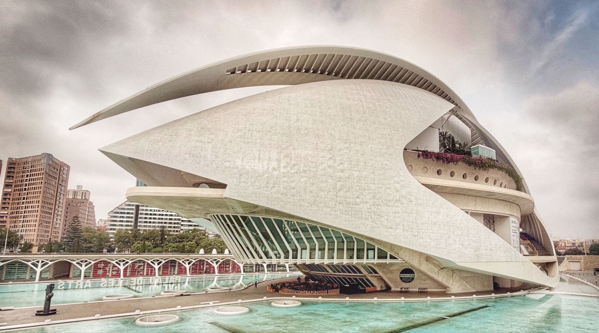 Palau de les Arts in Valencia beside reflecting pools.