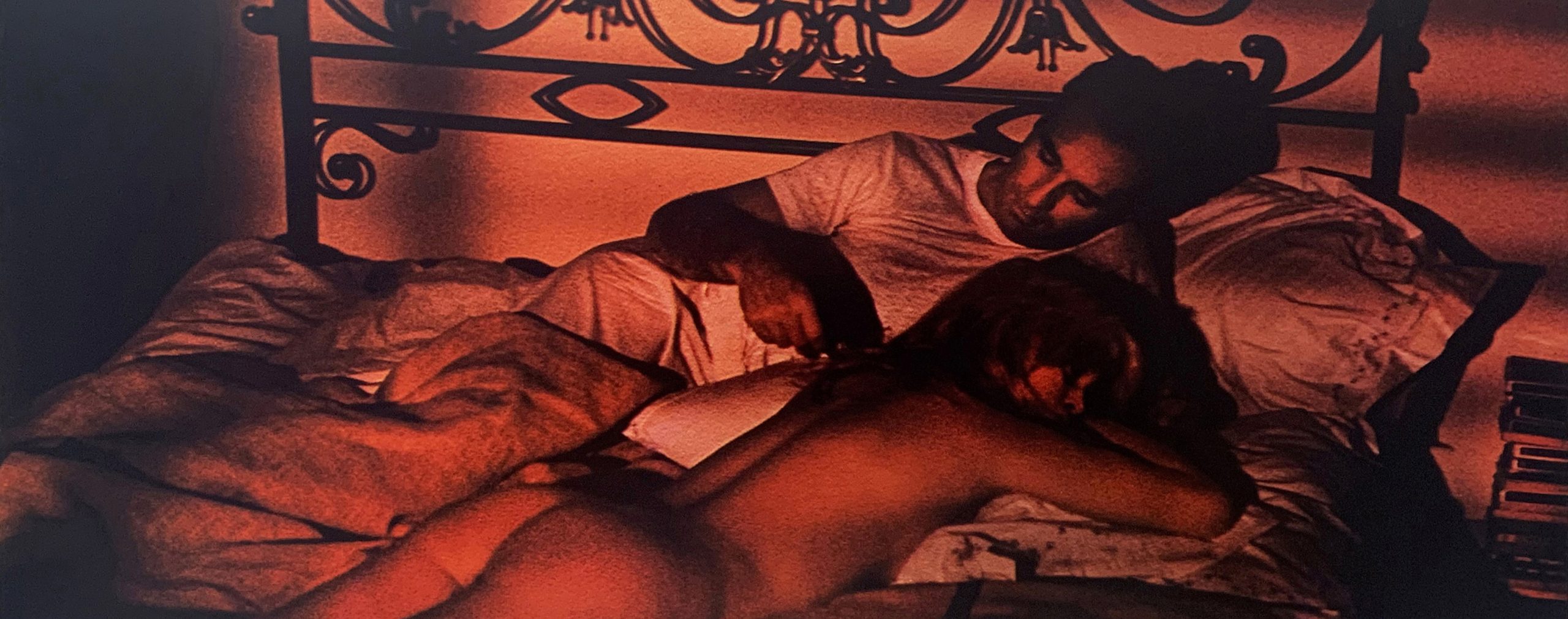 Jean Curran Godard Bardot print with a red-toned interior scene