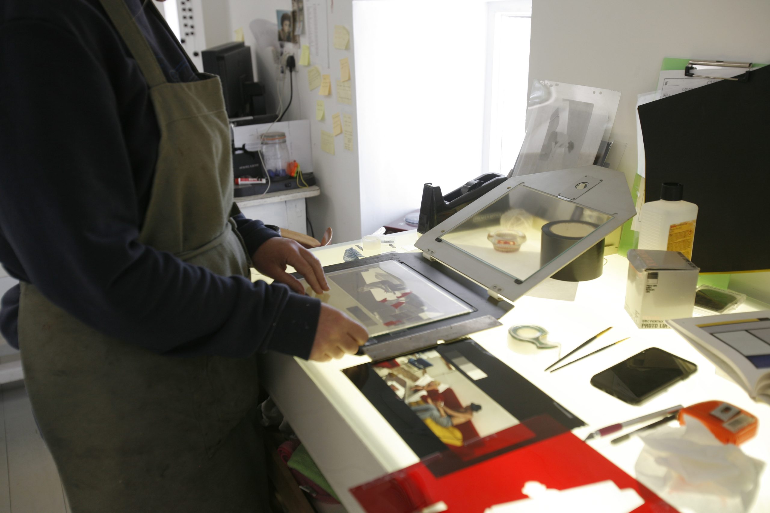 Jean Curran dye transfer printing materials on a studio worktable