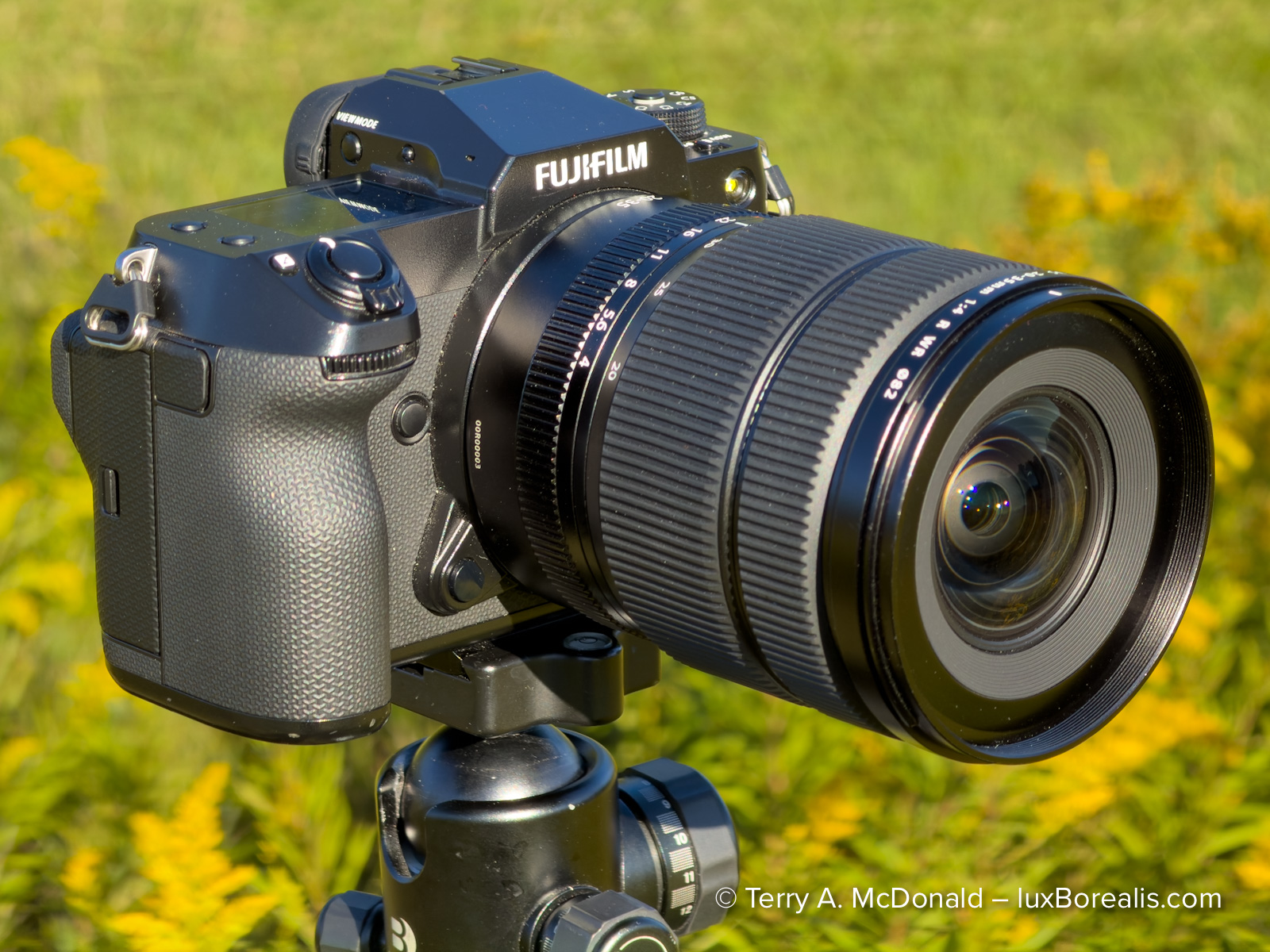 Fujifilm GFX 100S II camera with a Fujinon GF 20-35mm lens in a natural landscape setting.