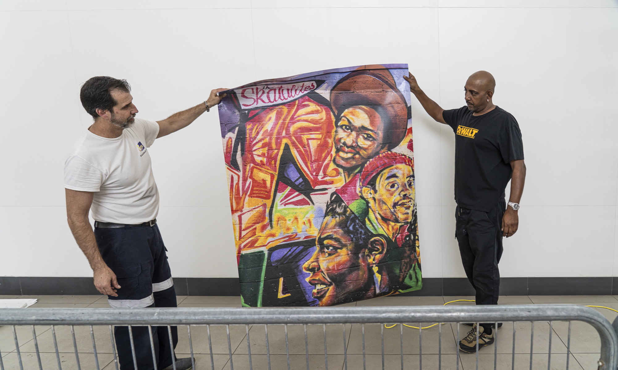 Printed mural panel being prepared for installation at Oakwood LRT Station