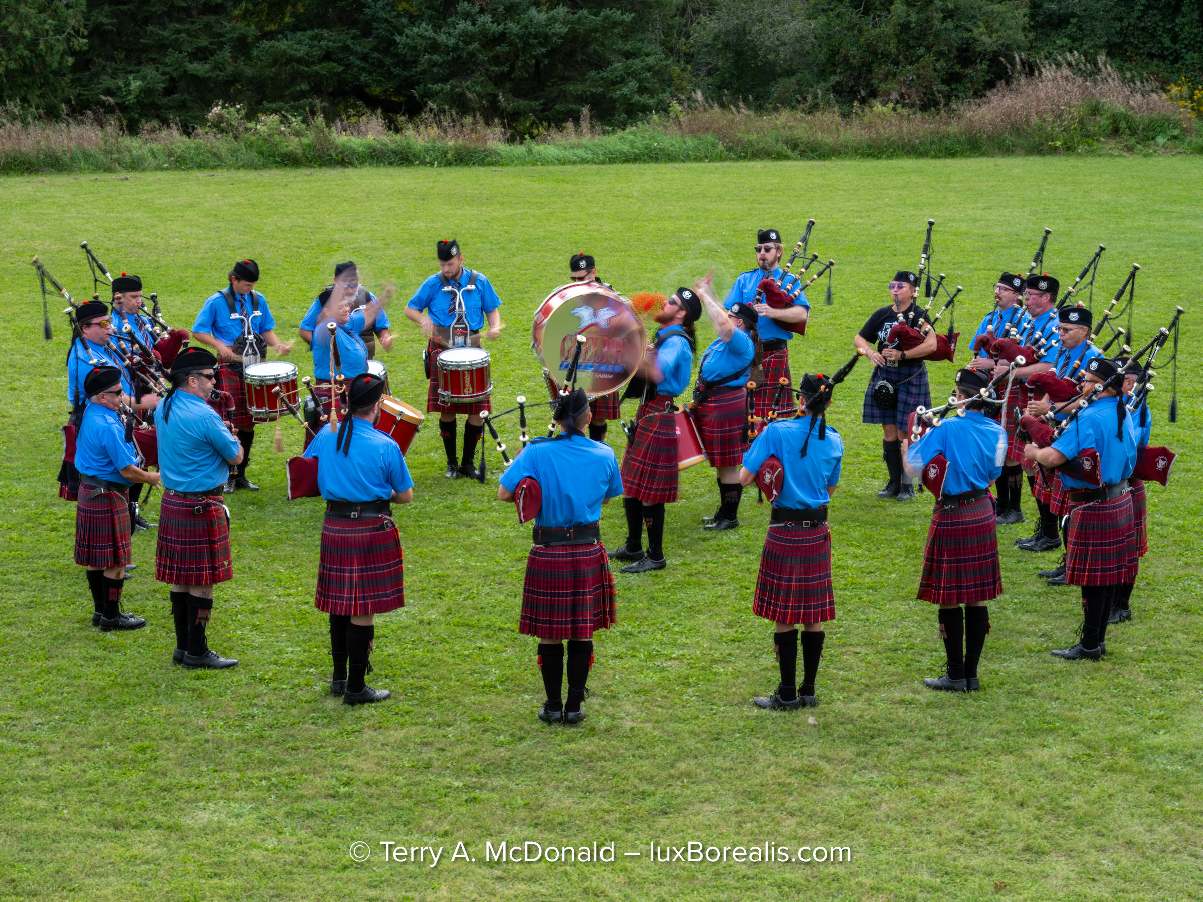 Fujifilm GFX 100S II photograph of the Guelph Pipe Band performing at a Scottish festival.