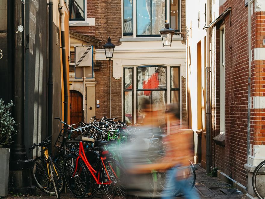 Live ND - Street scene captured with motion blur using the OM SYSTEM PEN