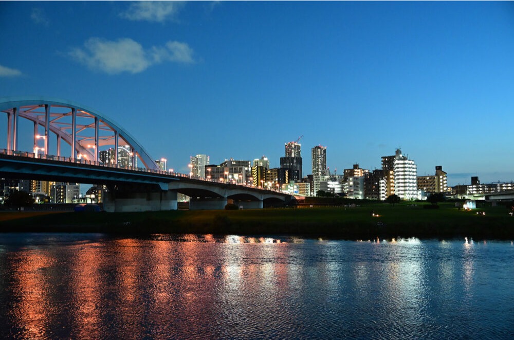 Nikon Z5IIC night photography sample showing a city bridge and reflections