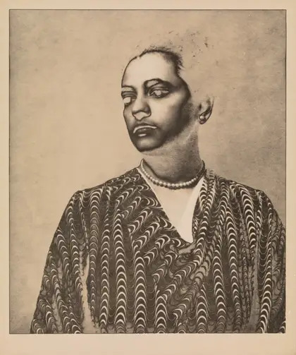 Portrait of a person wearing a patterned garment and a pearl necklace by Lionel Wendt