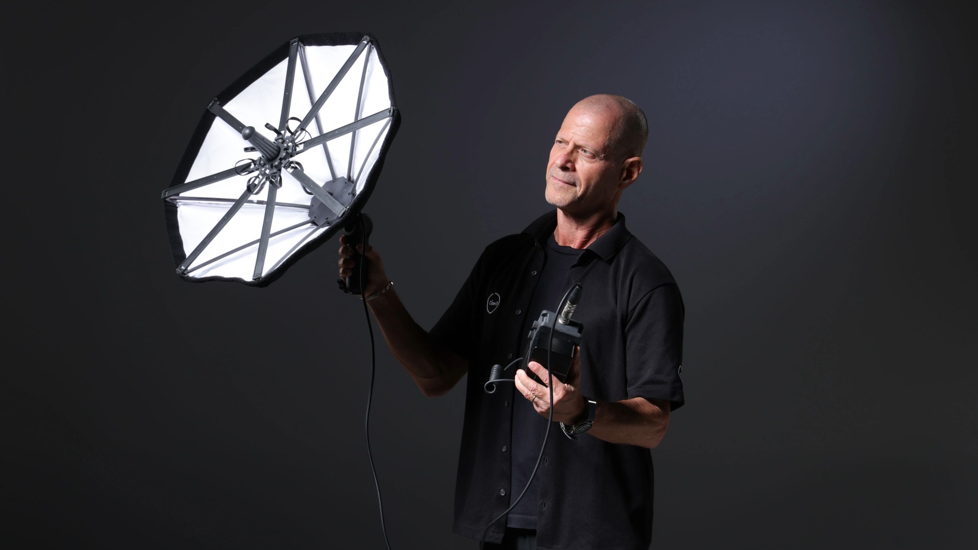 Johnnie holding the SmallRig and CineD OrBrella FM 60B prototype