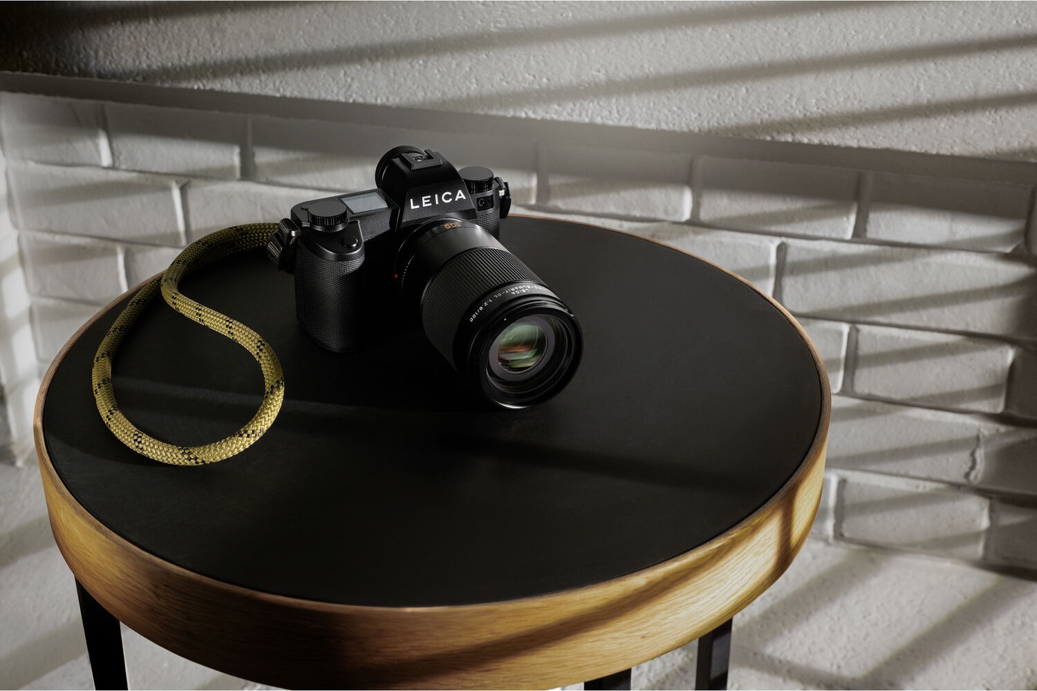 Leica camera with macro lens on a table